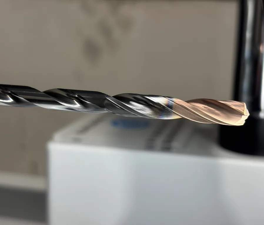 Deep long carbide solid coolant-thru drills with double margin design